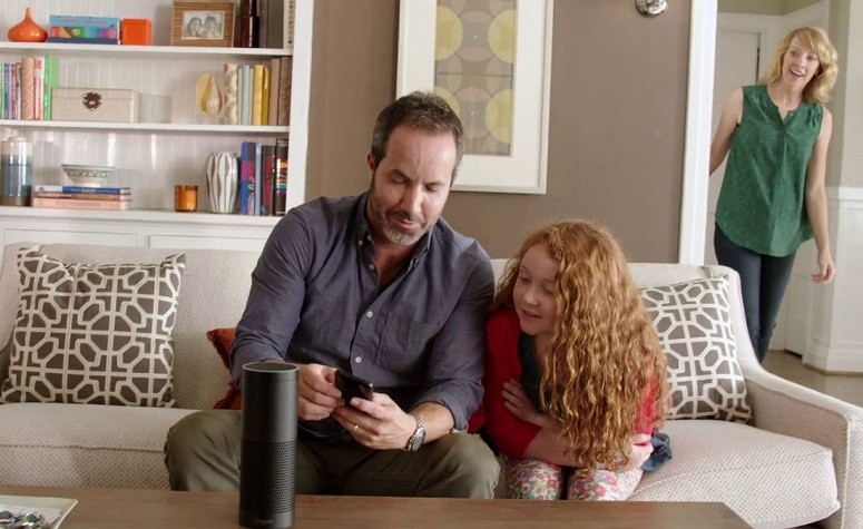 Dad And Daughter Using Amazon Echo